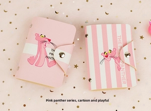 Detail of pink PU leather card holders with Pink Panther design and snap fastener