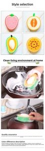 Macro view of multi-style fruit shaped dishwashing sponges for effective kitchen cleaning