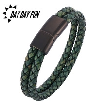 Detail of dark green woven double-layer leather bracelet with black magnetic metal clasp