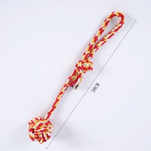 Detail of 38cm red and yellow braided cotton rope dog toy with ball and handle