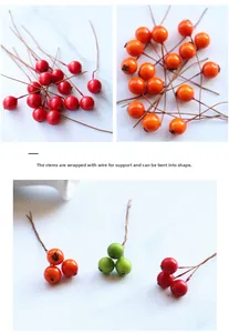 Detailed view of artificial berries with bendable wire stems for DIY floral arrangements