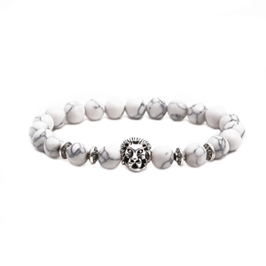Detailed close-up of white marble stone beads and silver lion head charm on the bracelet