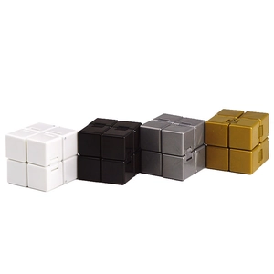Infinity cubes in white, black, silver, and gold finishes for stress relief toy detail