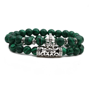 Detail of double-layer malachite beaded bracelet with vintage silver hollowed metal accents
