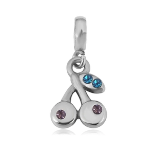 Macro shot of silver cherry charm with blue and purple rhinestones for DIY bracelets