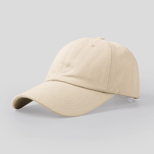 Detailed close-up of beige cotton canvas baseball cap with stitching and fabric label