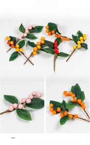 Detail of artificial berry branches with flexible iron wire core for easy DIY shaping