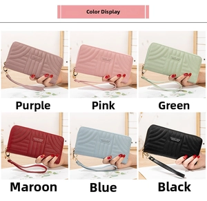 Detailed grid view showcasing six colorful PU leather wallets with quilted texture and wristlet