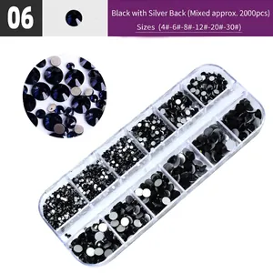 Detail view of 2000pcs black nail rhinestones in 12-slot clear storage box organizer