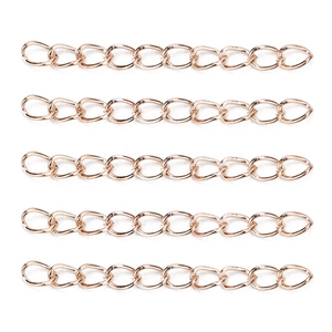 Detail view of five rose gold extension chains for DIY jewelry making and bracelets