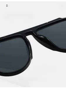 Detail of comfortable integrated nose pads on black oversized fashion sunglasses