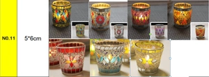 Detail of handcrafted mosaic glass candle holder with floral pattern and dimensions 5x6cm