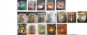Detail showing various mosaic glass candle holders with seashell and rope decor