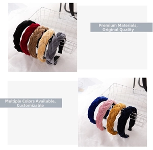 Close-up of velvet braided headbands in multiple colors displayed in a metal wire basket