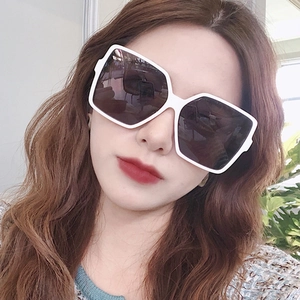 Fashionable oversized square white frame sunglasses with dark lenses for women