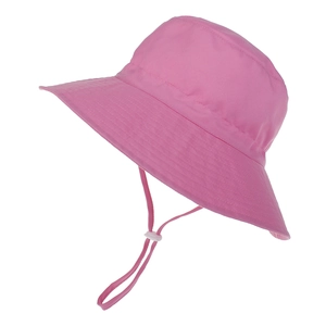 Detail of pink kids bucket hat with adjustable chin strap and wide sun protection brim