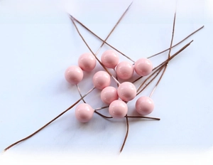 Detail of 10mm pink artificial berry picks for DIY crafts and Christmas gift decoration