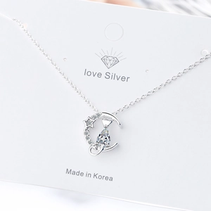 Silver necklace featuring a moon, star and cat pendant with a water-drop zircon stone