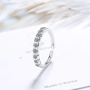 Elegant adjustable silver ring for women featuring a single row of sparkling zircon stones