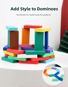 Detailed view of colorful wooden dominoes showing smooth wood texture and creative stacking