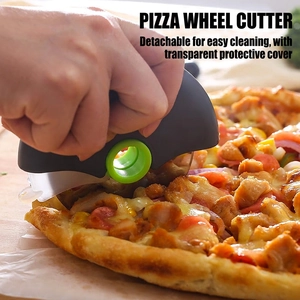 Circular stainless steel pizza cutter with green accent handle and protective cover