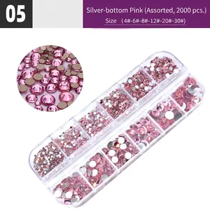 Pink flatback rhinestones set in 12-grid organizer for nail art and craft decoration