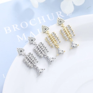 Fishbone stud earrings in gold and silver finish with sparkling zircon stones
