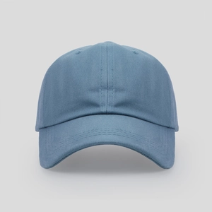 Detailed close-up showing navy blue cotton twill fabric and stitching on baseball cap