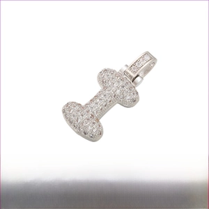 Macro view of iced-out letter I pendant with rhodium plating and cubic zirconia