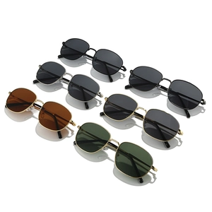 Retro oval sunglasses with thin metal frames in multiple colors and dark lenses