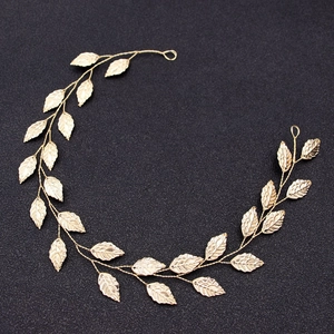 Elegant gold leaf bridal headband handmade with metallic wire vine for wedding hair styling