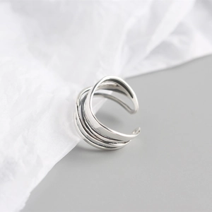 Macro view of minimalist S925 sterling silver multilayer irregular winding ring