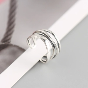 Macro shot of silver S925 sterling silver multi-layer wrapped irregular line ring