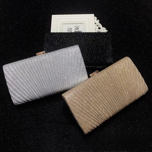 Three-color set of pleated sequin evening clutch bags in gold, silver and black