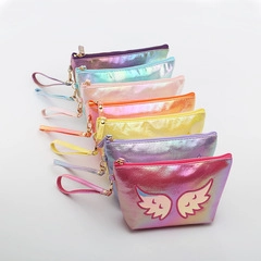 Close-up of small glossy makeup bags in multiple colors with wrist straps and zip closure