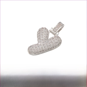 Macro view of rhodium plated hip hop B letter pendant with pave set clear cubic zirconia
