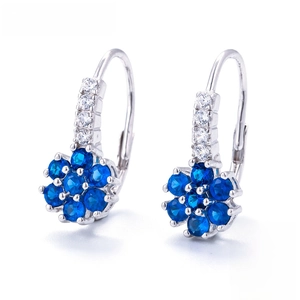 Detailed view of 925 sterling silver floral earrings with dark blue zircon petals