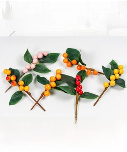 Artificial colorful berry stems with green leaves shown in five vibrant glossy shades