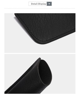 Détail macro de l'étui à lunettes en cuir noir grainé avec coutures renforcées et doublure