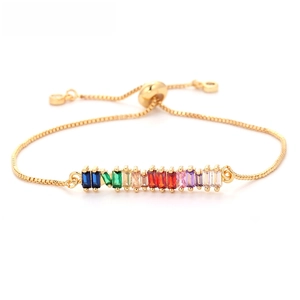 Detail of adjustable gold-tone bracelet with rainbow colored rectangular zircons