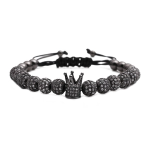Woven bracelet with crown charm and micro-set black cubic zirconia stones on beads