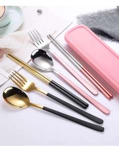 Detailed close-up of 304 stainless steel portable cutlery sets in pink storage case