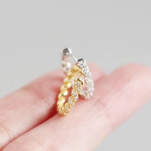 Sparkling S925 sterling silver hoop earrings with twisted design and clear zircon stones