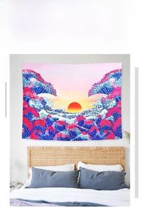 Bedroom wall decor featuring Great Wave off Kanagawa tapestry in soft pink and blue tones