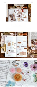 Detail of vintage PET floral stickers and lifestyle scrapbooking materials on wooden background