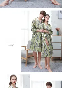 Detail of couple's ice silk bathrobes featuring a geometric oval pattern and V-neck design