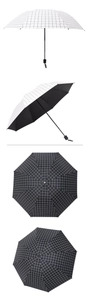 Detailed view of black and white checkered umbrella with sun-protective vinyl coating
