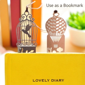 Vintage metal hollow bookmarks in birdcage and hot air balloon shapes with ruler scale