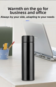 Smart LED temperature display on black matte stainless steel vacuum flask for office
