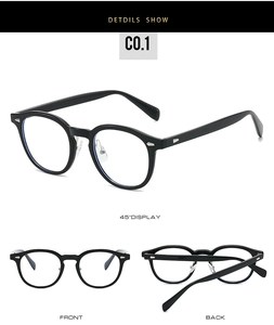 Detail view of TR90 vintage black round frame glasses with silver accents and clear lenses